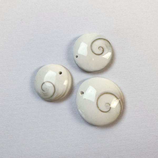 Amuleto Occhio di Santa Lucia, tondo forato | 2,5 - 3 cm